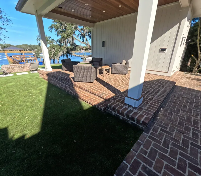 Pavilion with herringbone brick steps overlooking the water in Charleston, SC