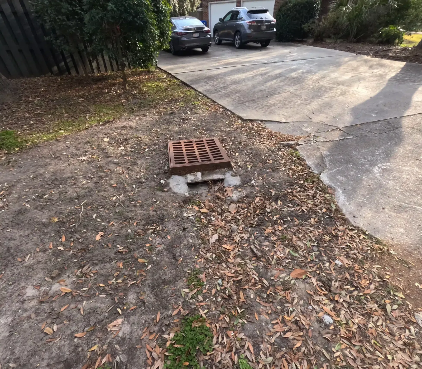 Storm drain basin set at the low point of a driveway in James Island, SC