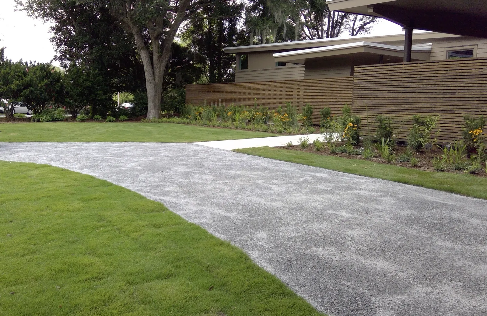 Plantation mix gravel driveway at a modern home in Mount Pleasant, SC Plantation mix gravel driveway at a modern home in Mount Pleasant, SC