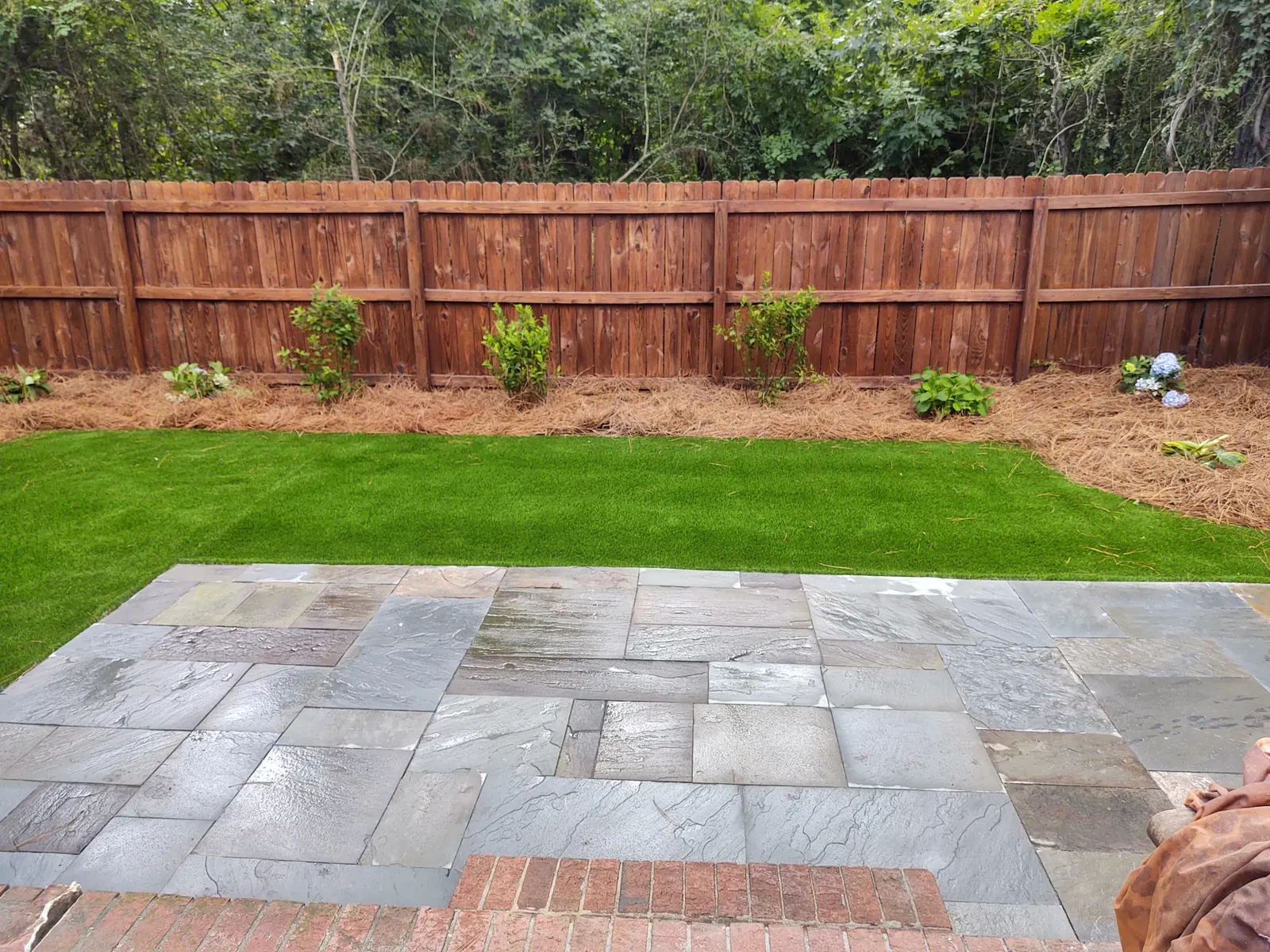 Bluestone patio and artificial turf in North Charleston, SC