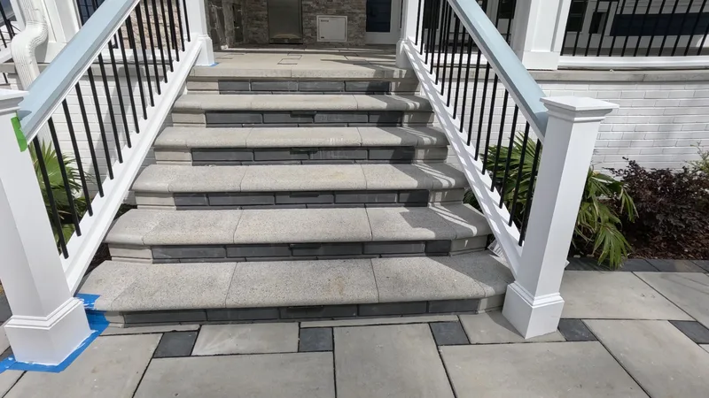 Techo-Bloc paver steps with white railings in Summerville, SC