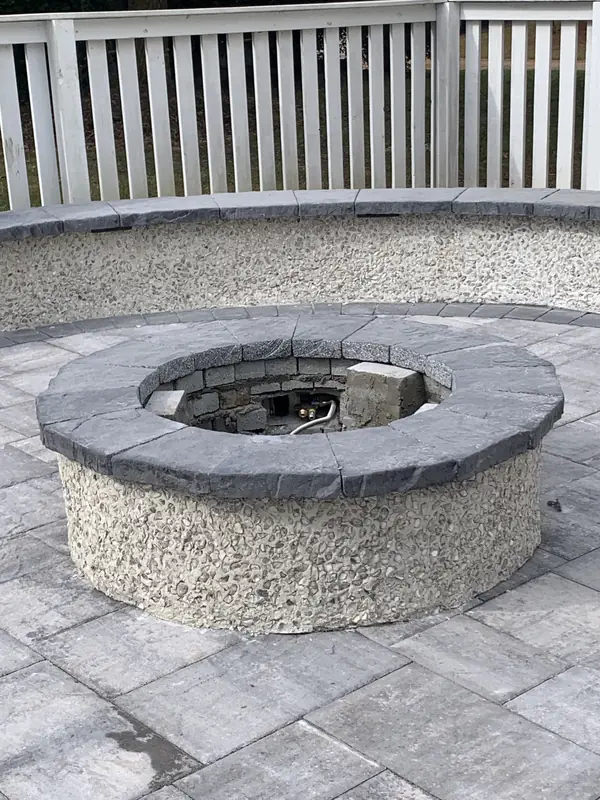 Tabby fire pit sitting wall by Cramers Landscaping, Charleston area